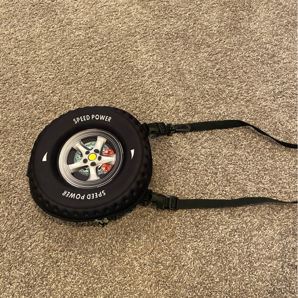 ROMWE Speed Power purse, shaped like a tire. Wore 4 times.